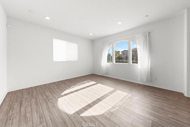 16075 Osprey Ave, Chino, CA 91708 - empty room with wood finished floors and recessed lighting