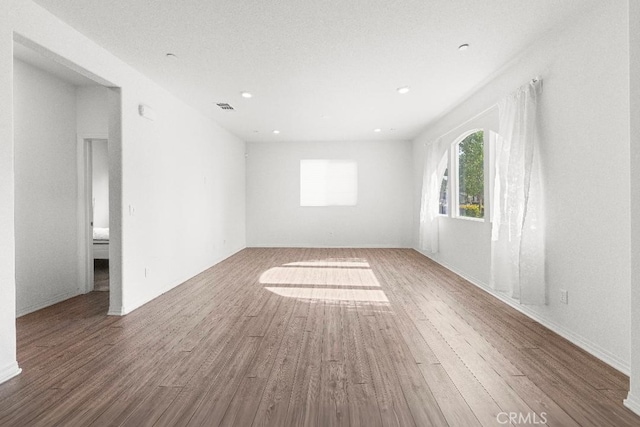16075 Osprey Ave, Chino, CA 91708 - unfurnished room with wood finished floors and recessed lighting