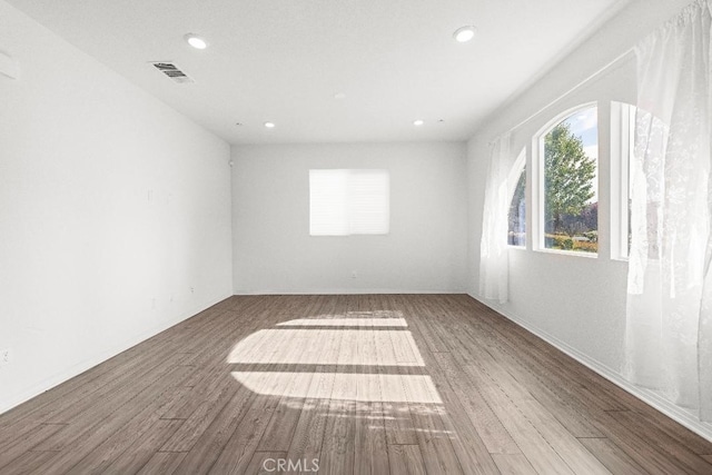 16075 Osprey Ave, Chino, CA 91708 - spare room featuring wood finished floors and recessed lighting
