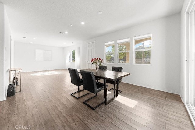 16075 Osprey Ave, Chino, CA 91708 - dining room with wood finished floors and recessed lighting