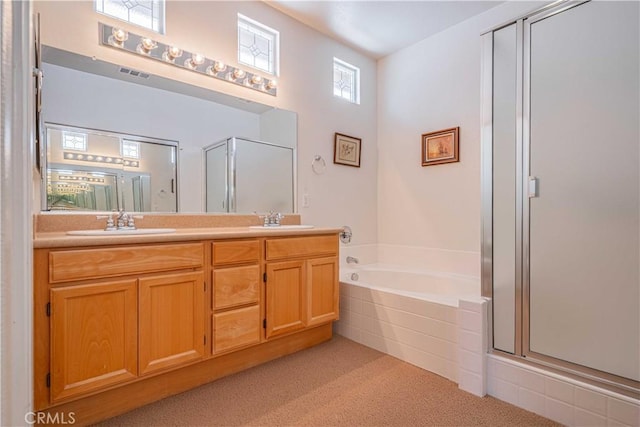 28044 Oakhaven Ln, Menifee, CA 92584 - full bathroom featuring a shower stall, a garden tub, double vanity, and carpet