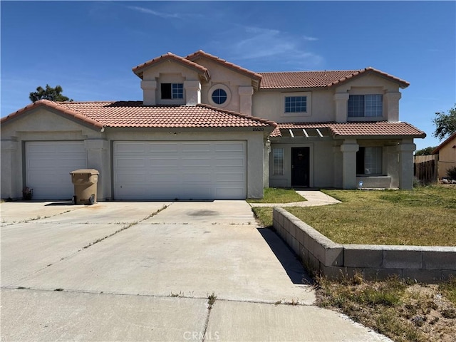 15620 Smoke Tree St, Hesperia, CA 92345 - mediterranean / spanish home with driveway, an attached garage, stucco siding, a front yard, and a tile roof
