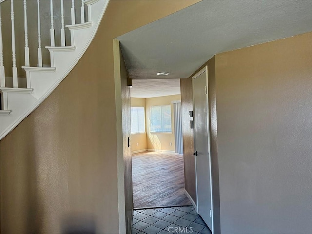 15620 Smoke Tree St, Hesperia, CA 92345 - corridor with tile patterned floors and stairs