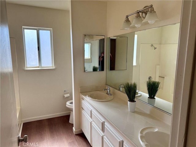 15620 Smoke Tree St, Hesperia, CA 92345 - full bathroom with double vanity, wood finished floors, and shower / bath combination