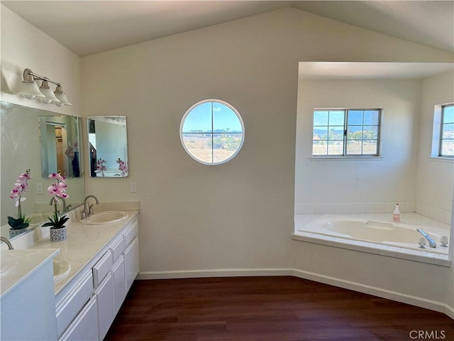 15620 Smoke Tree St, Hesperia, CA 92345 - full bath with double vanity, wood finished floors, a garden tub, and vaulted ceiling