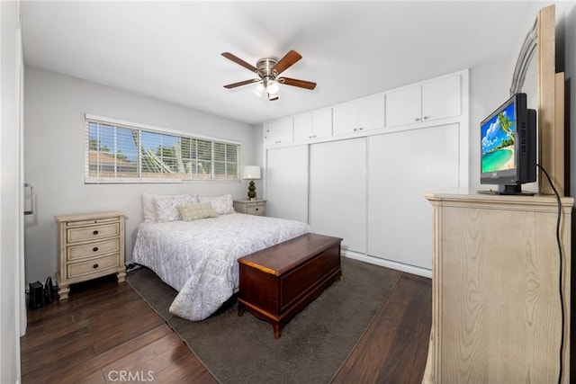 261 E Fig Ave, Monrovia, CA 91016 - bedroom with dark wood-style flooring, a closet, and ceiling fan