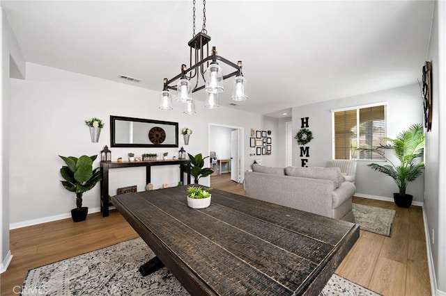 27286 Wedgewood Way, Murrieta, CA 92562 - dining space featuring wood finished floors and baseboards