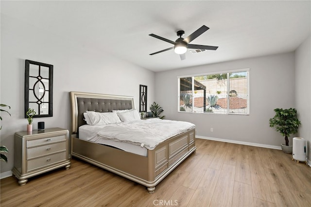 27286 Wedgewood Way, Murrieta, CA 92562 - bedroom with light wood-style floors, baseboards, and a ceiling fan