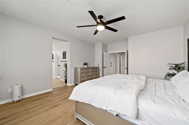 27286 Wedgewood Way, Murrieta, CA 92562 - bedroom featuring light wood-style flooring, baseboards, a ceiling fan, and ensuite bathroom