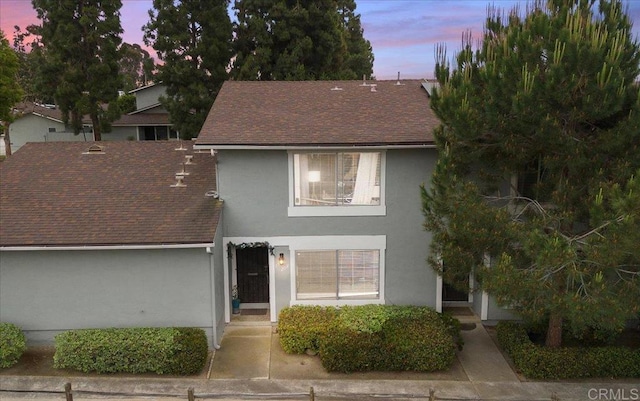 1539 Sonora Dr Unit 258, Chula Vista, CA 91911 - view of front of home with stucco siding and roof with shingles