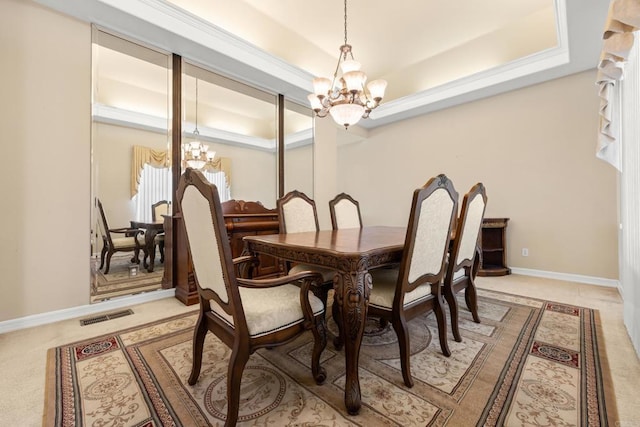 30700 Spyglass Way, Canyon Lake, CA 92587 - dining space featuring a chandelier, light colored carpet, a tray ceiling, and baseboards