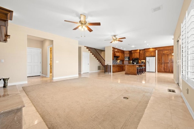 30700 Spyglass Way, Canyon Lake, CA 92587 - unfurnished living room with light tile patterned flooring, ceiling fan, stairway, recessed lighting, and baseboards