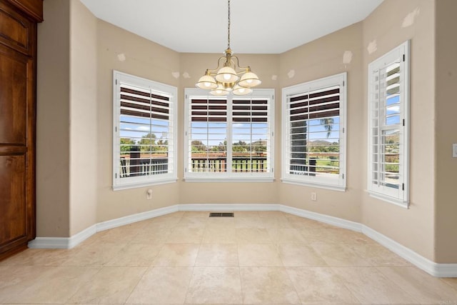 30700 Spyglass Way, Canyon Lake, CA 92587 - unfurnished dining area featuring a chandelier, baseboards, and light tile patterned floors