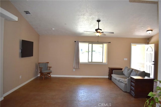 8065 Oxford Ave, Hesperia, CA 92345 - living area with finished concrete flooring, ceiling fan, and baseboards