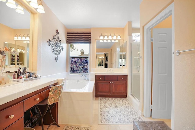 7132 Torrey Mesa Ct, San Diego, CA 92129 - full bath featuring a stall shower, a bath, two vanities, and tile patterned flooring