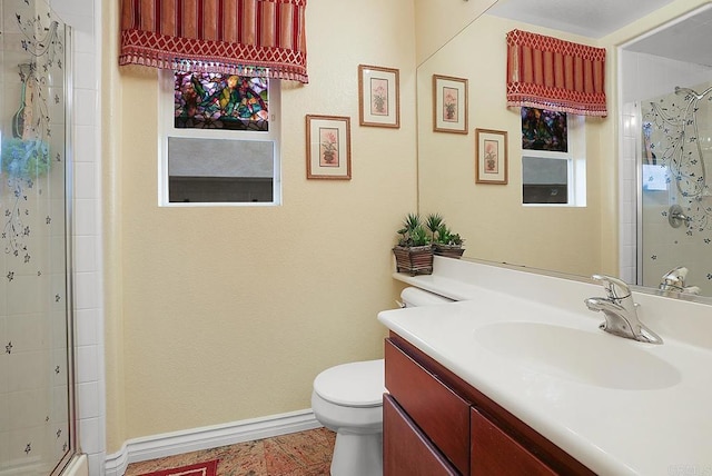 7132 Torrey Mesa Ct, San Diego, CA 92129 - bathroom with a shower stall, toilet, vanity, and baseboards