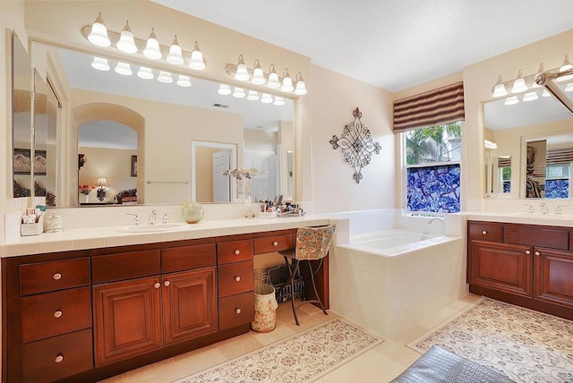 7132 Torrey Mesa Ct, San Diego, CA 92129 - ensuite bathroom with tile patterned flooring, a garden tub, and two vanities