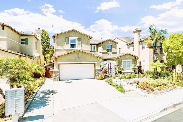 7132 Torrey Mesa Ct, San Diego, CA 92129 - view of front of property with concrete driveway, stucco siding, an attached garage, a residential view, and stone siding