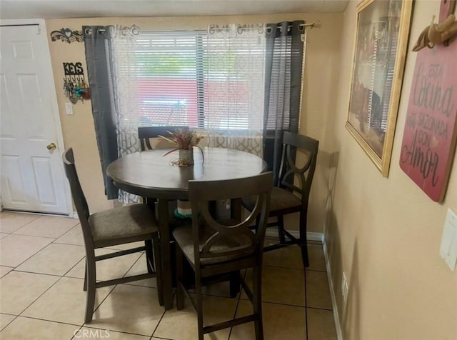 16739 Upland, Fontana, CA 92335 - dining room featuring baseboards and light tile patterned floors