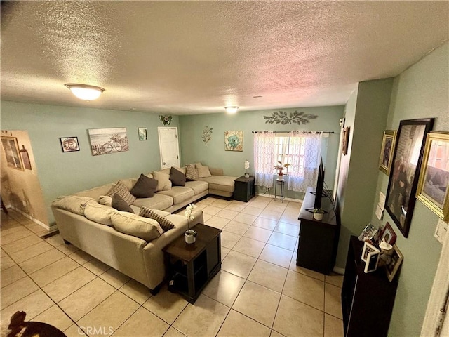 16739 Upland, Fontana, CA 92335 - living room with a textured ceiling and light tile patterned floors