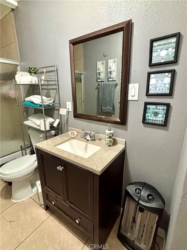 16739 Upland, Fontana, CA 92335 - full bathroom featuring tile patterned flooring, vanity, and toilet