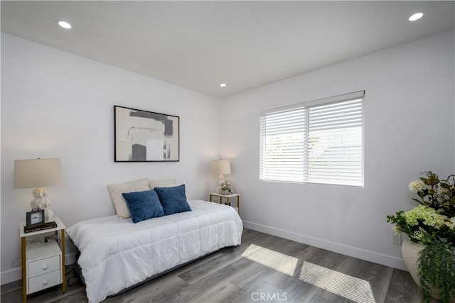 10806 S St Andrews Pl, Los Angeles, CA 90047 - bedroom with baseboards, wood finished floors, and recessed lighting