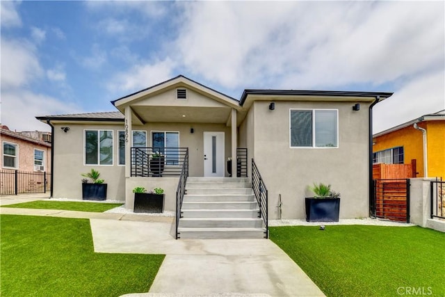 10806 S St Andrews Pl, Los Angeles, CA 90047 - view of front of house featuring stucco siding