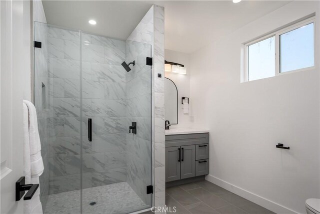 10806 S St Andrews Pl, Los Angeles, CA 90047 - full bathroom featuring marble finish flooring, vanity, baseboards, a stall shower, and recessed lighting