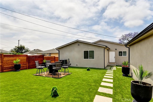 10806 S St Andrews Pl, Los Angeles, CA 90047 - rear view of property featuring stucco siding