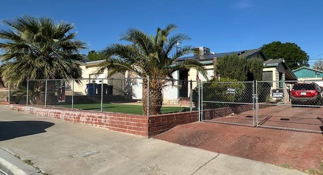 824 S 2nd Ave, Barstow, CA 92311 - view of front of property with a gate