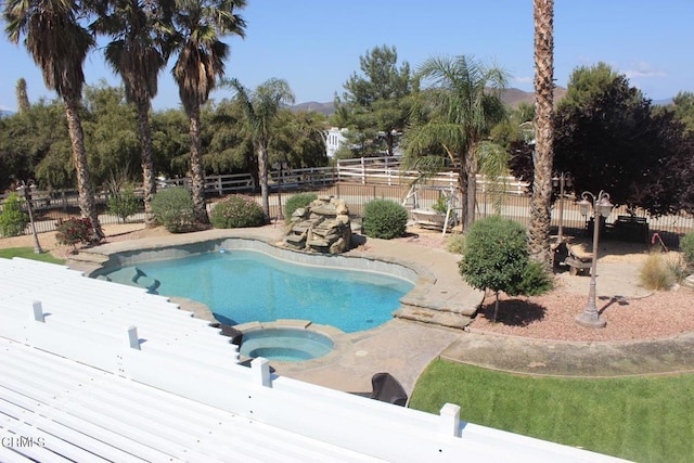 35135 Caprock Rd, Santa Clarita, CA 91390 - view of pool featuring an in-ground hot tub, a fenced backyard, and a mountain view
