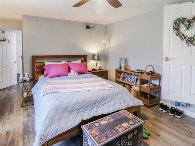 2026 W 94th Pl, Los Angeles, CA 90047 - bedroom with wood finished floors and ceiling fan