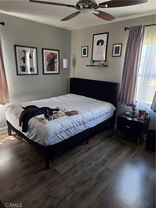 2026 W 94th Pl, Los Angeles, CA 90047 - bedroom with wood finished floors, ceiling fan, and baseboards