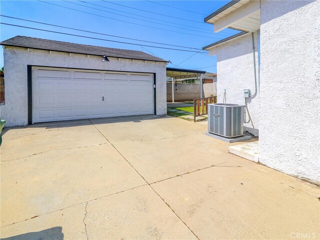 2026 W 94th Pl, Los Angeles, CA 90047 - detached garage featuring central AC unit