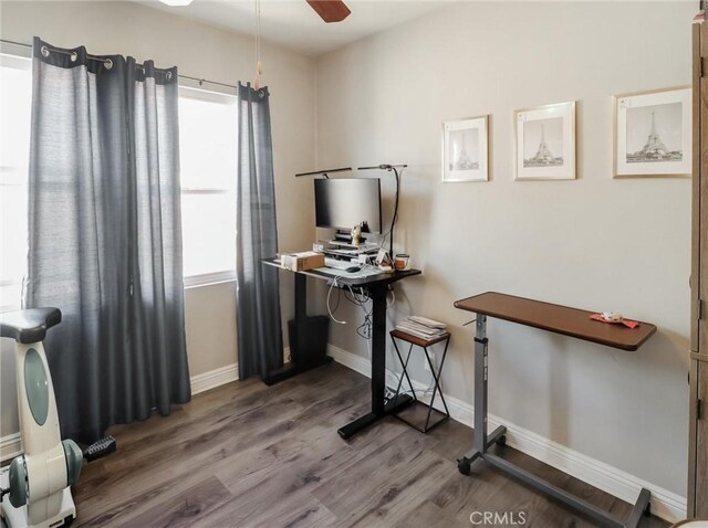 2026 W 94th Pl, Los Angeles, CA 90047 - office space featuring wood finished floors, a ceiling fan, and baseboards