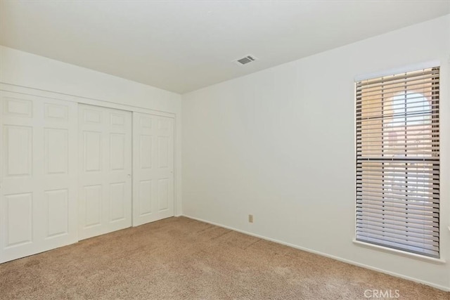 19126 Frances St, Apple Valley, CA 92308 - unfurnished bedroom featuring carpet flooring, a closet, and baseboards