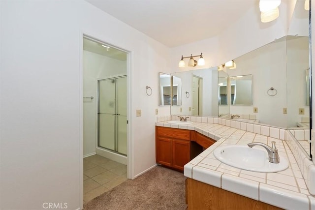 19126 Frances St, Apple Valley, CA 92308 - bathroom with a shower stall, double vanity, and tile patterned flooring