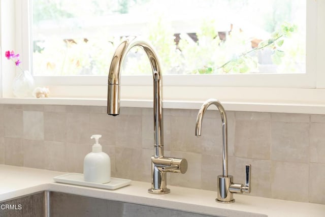 202 N Fulton St, Ojai, CA 93023 - kitchen view of decorative backsplash, a sink, and light countertops