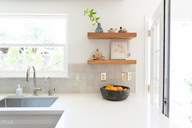202 N Fulton St, Ojai, CA 93023 - kitchen featuring a sink, open shelves, tasteful backsplash, and light countertops