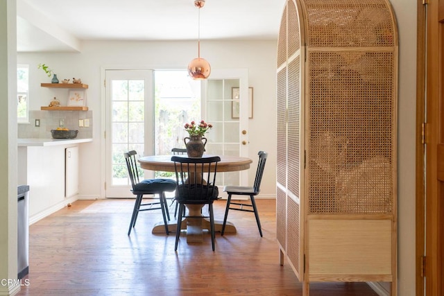 202 N Fulton St, Ojai, CA 93023 - dining room with light wood-style flooring and baseboards