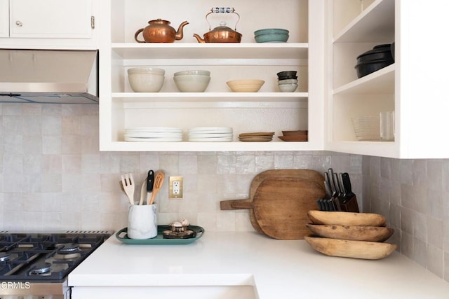 202 N Fulton St, Ojai, CA 93023 - kitchen view of decorative backsplash, ventilation hood, light countertops, and open shelves