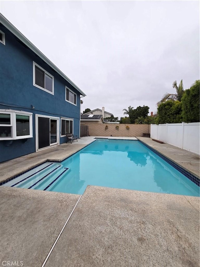 17352 Rob Roy Cir, Huntington Beach, CA 92647 - view of swimming pool with a fenced backyard and a patio