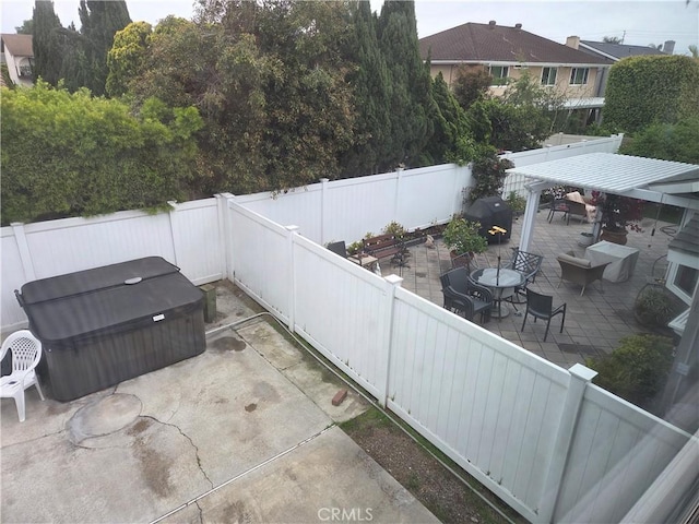 17352 Rob Roy Cir, Huntington Beach, CA 92647 - fenced backyard featuring a patio area, a hot tub, and outdoor dining area