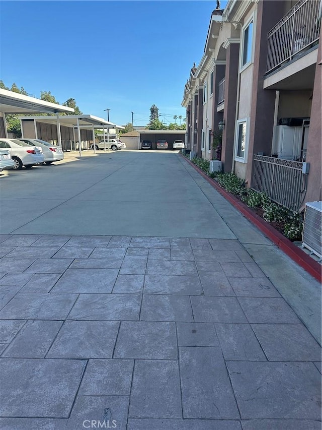 17888 Alburtis Ave Unit B112, Artesia, CA 90701 - view of concrete driveway