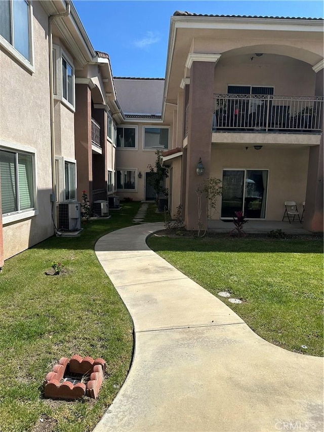 17888 Alburtis Ave Unit B112, Artesia, CA 90701 - surrounding community featuring a lawn