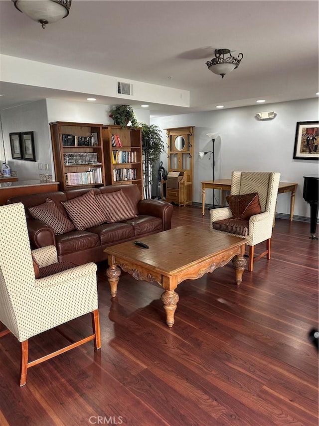 17888 Alburtis Ave Unit B112, Artesia, CA 90701 - living room featuring wood finished floors and baseboards