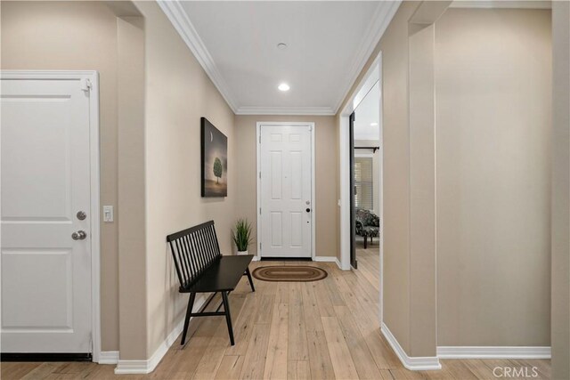 44260 Nighthawk Pass, Temecula, CA 92592 - foyer entrance featuring light wood-style floors, baseboards, crown molding, and recessed lighting