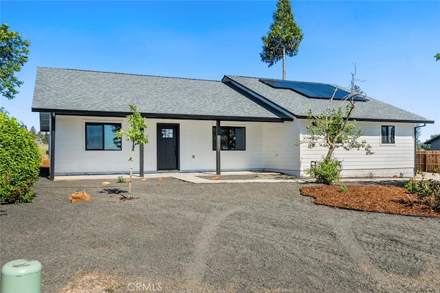 5676 Paradise Ave, Paradise, CA 95969 - ranch-style house featuring roof with shingles and roof mounted solar panels