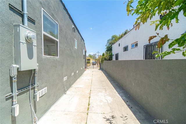 6751 7th Ave, Los Angeles, CA 90043 - view of side of home featuring stucco siding and crawl space