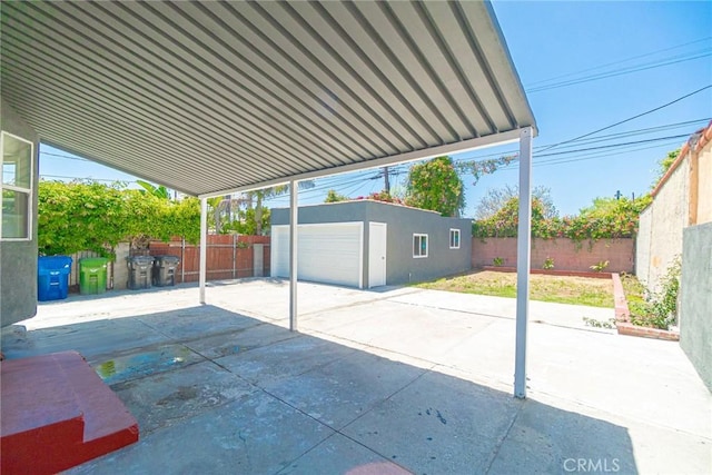 6751 7th Ave, Los Angeles, CA 90043 - fenced backyard featuring an outbuilding and a patio